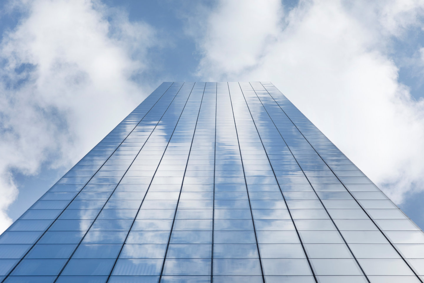 Glass tower sky reflections
